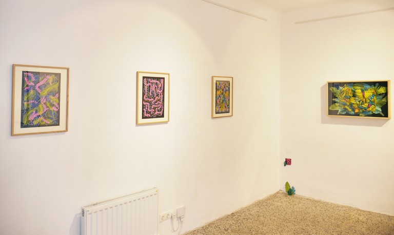 Exbition roon view, artworks hanging on wall, collages, papercut, drawings